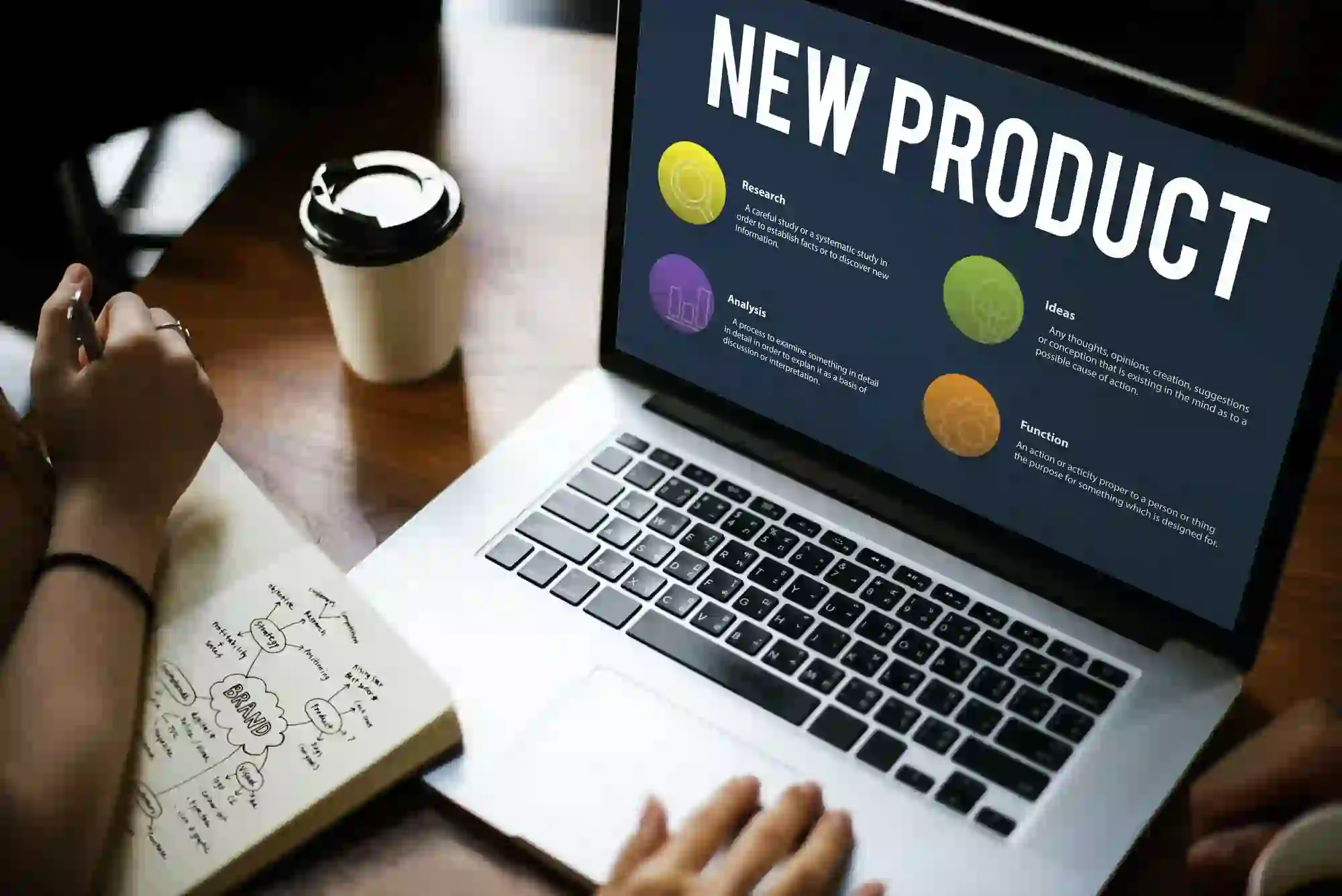 a laptop with the word new product on it.